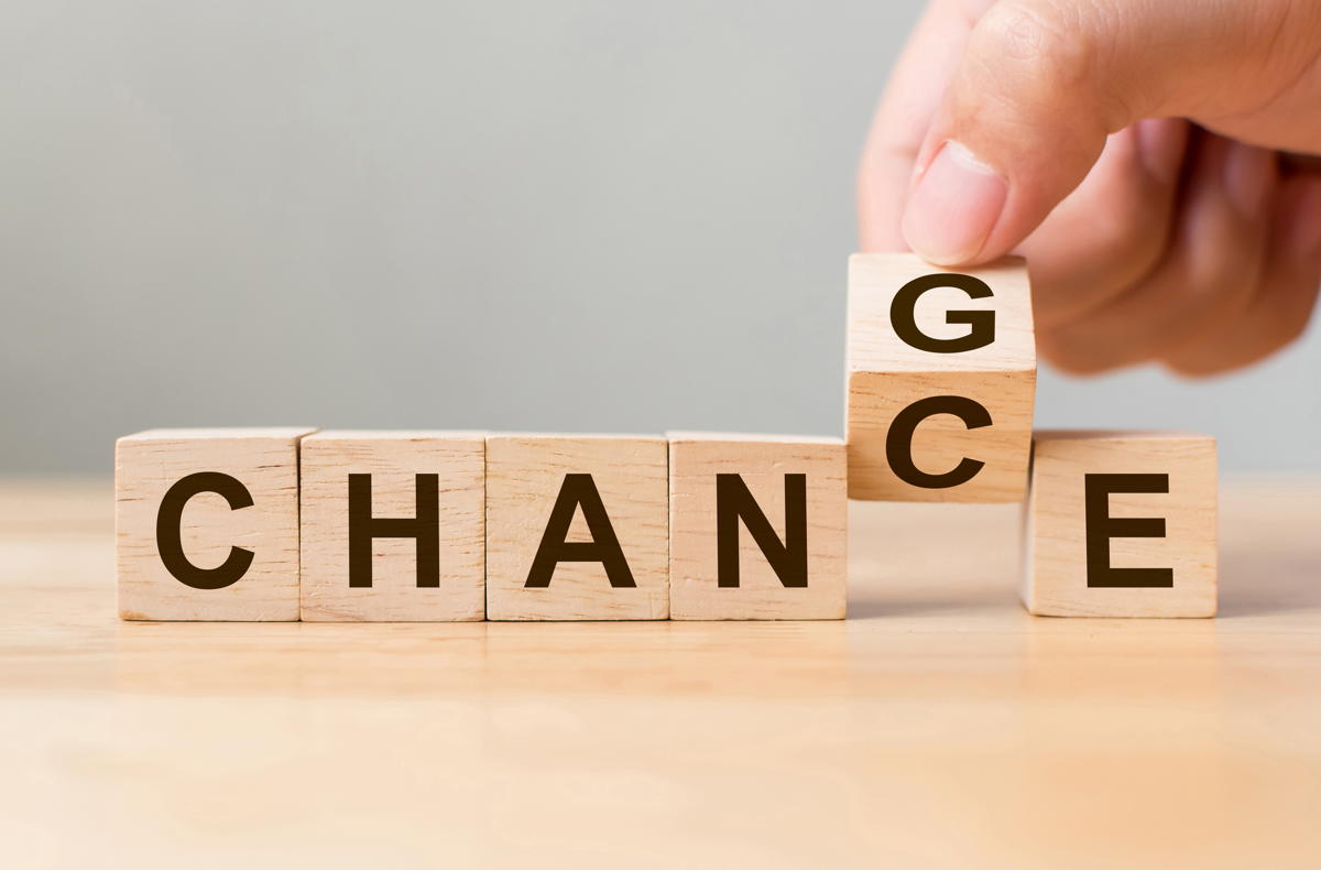letter cubes spell chance and the c is being flipped to g for change