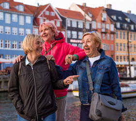 3 senior women exploring Amsterdam